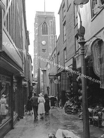 ST JOHN'S CHURCH WITH PEDESTRIANS & SHOPS